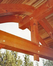 post and beam supporting timber frame arch